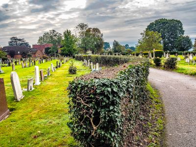 Path leading to church through cemetery