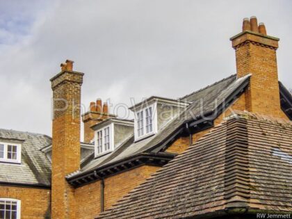 Red roof and chimneys with attic windows. Woodhall Spa. England - Photo Walk UK
