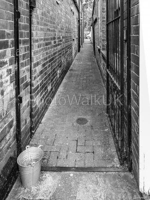 Tin Bucket in an Alleyway, Woodhall Spa - Photo Walk UK