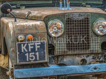 Front of series 1 Landrover with headlamps with rust and battered. - Photo Walk UK